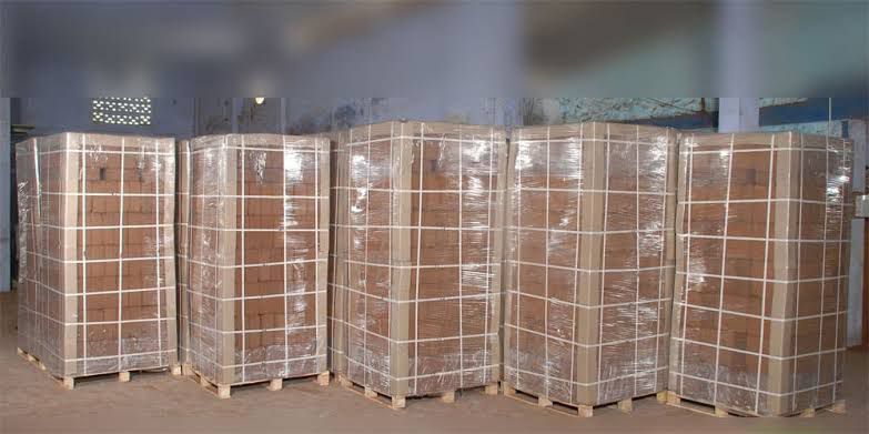 Coir blocks wrapped and palletized for packing